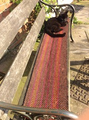 Hobo on a hand dyed wool bench runner
