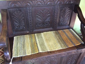 Bench runner on oak settle