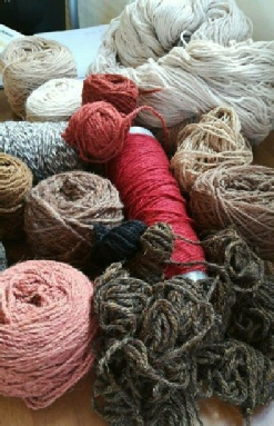 A selection of yarns for a new floor rug